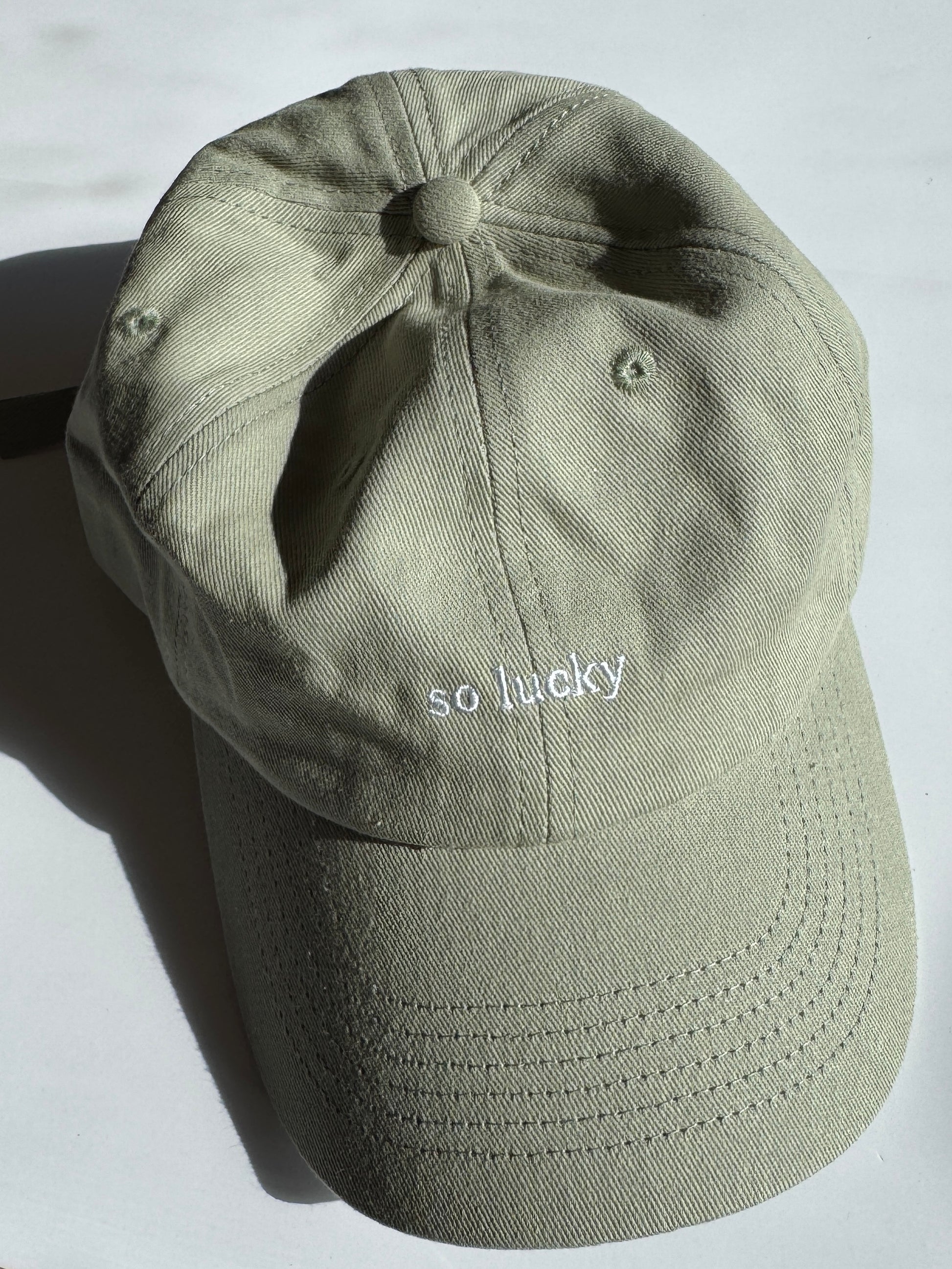 Cap "so lucky" green