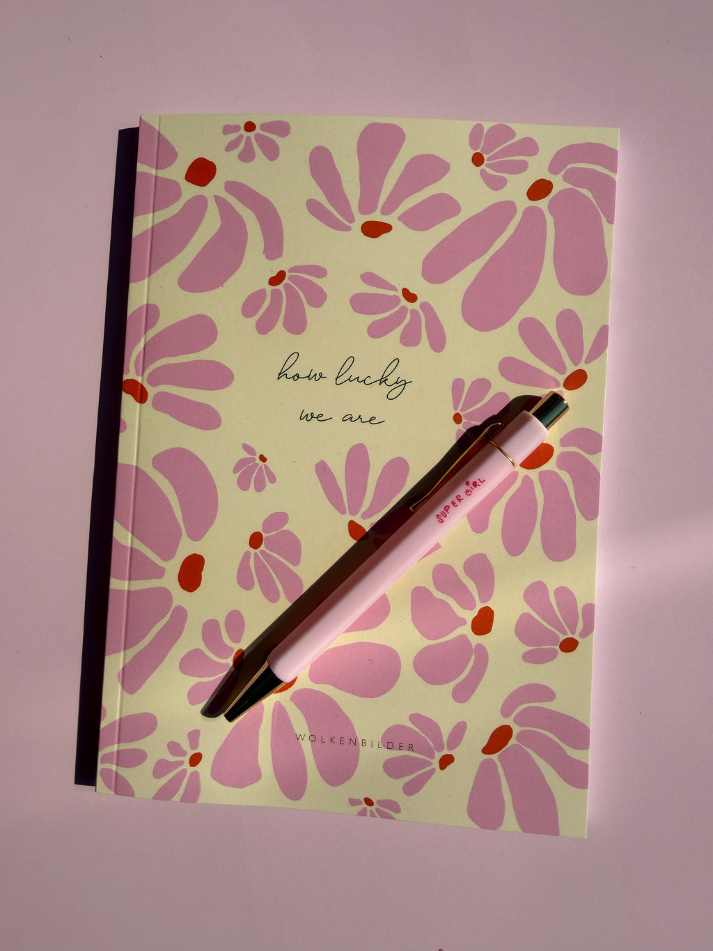 Notizbuch “HOWLUCKY”